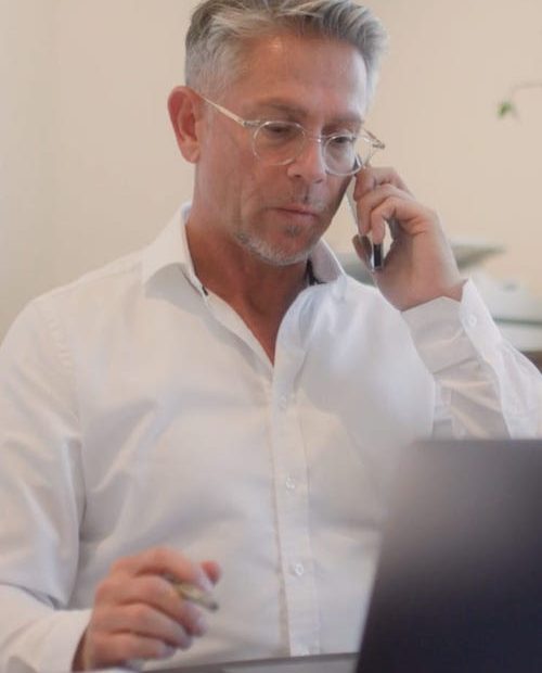 Jason Foote on the phone (Property Investors)